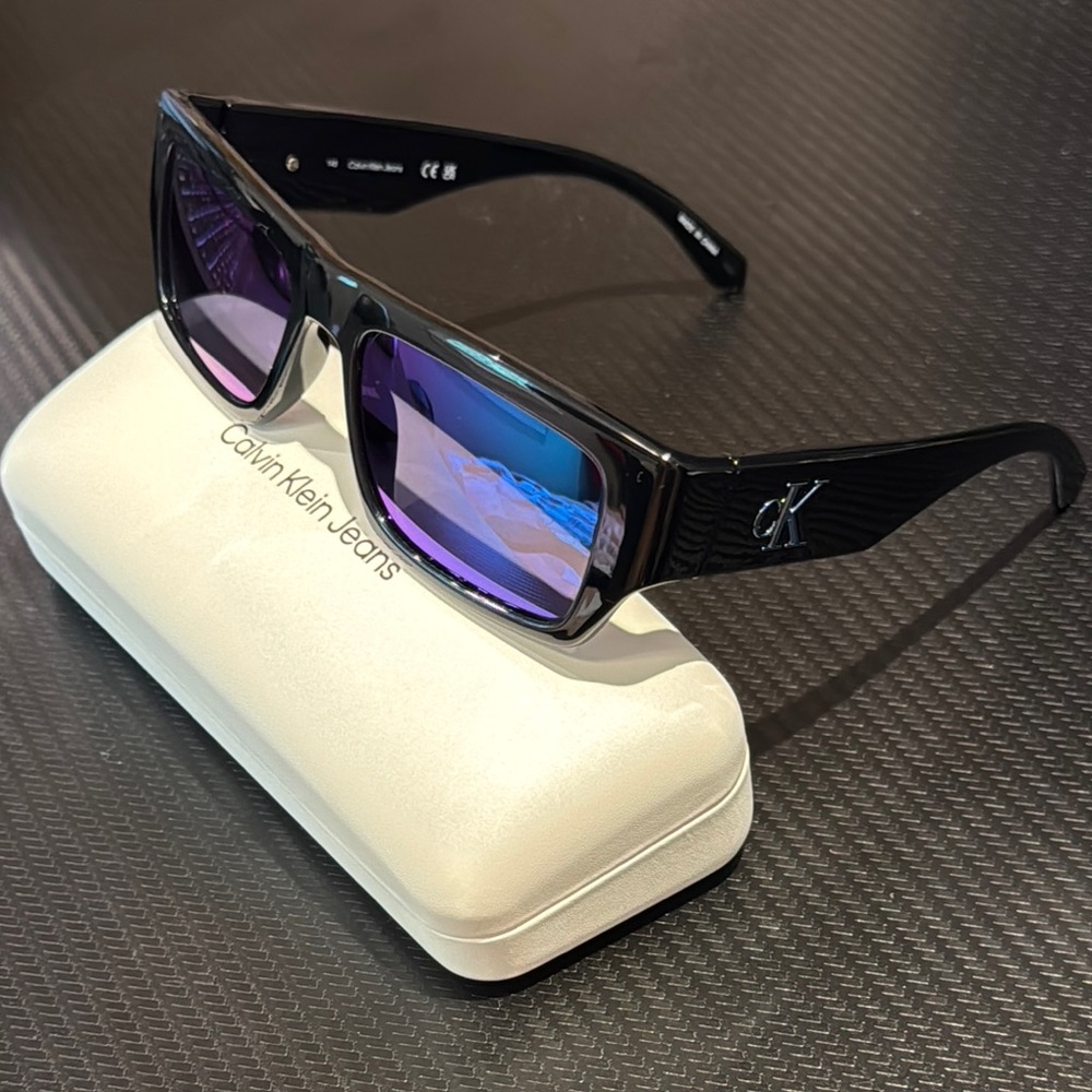 Calvin Klein Black Sunglasses with Dark Purple Lenses